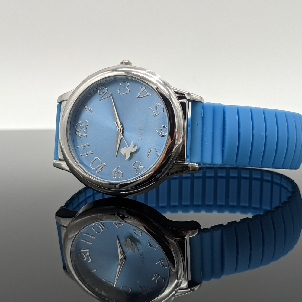 Silver & Blue stretch band watch free battery.